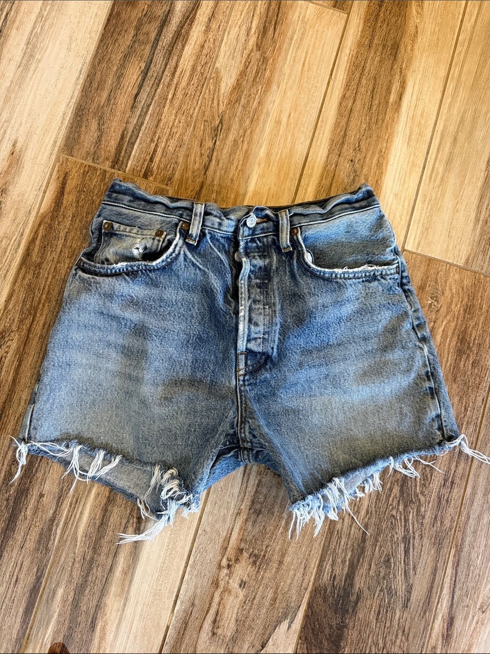 AGOLDE High-Rise Medium Blue Distressed Denim Shorts
